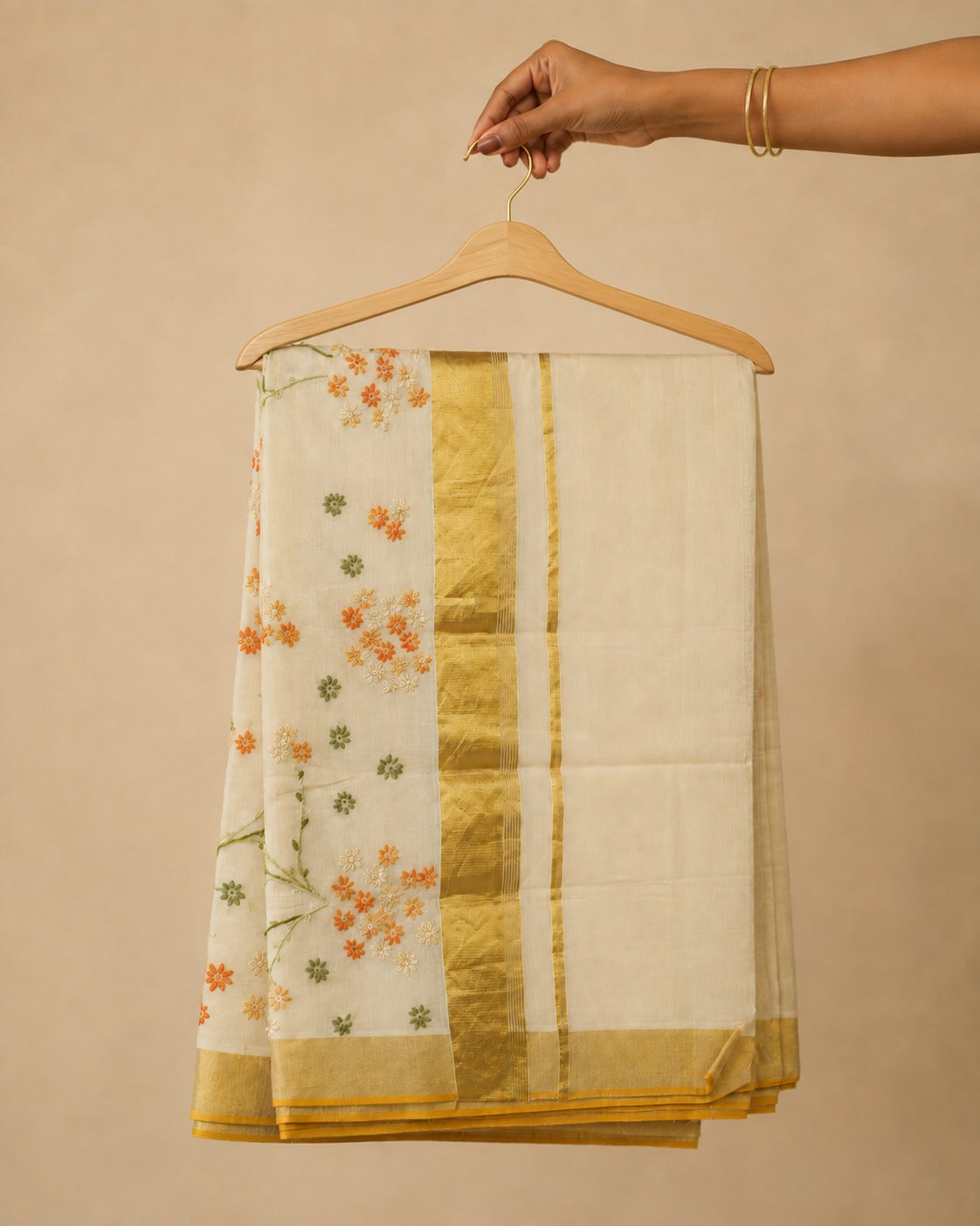 Malarvaadi - Tradition blooms beautifully when ivory meets delicate florals.