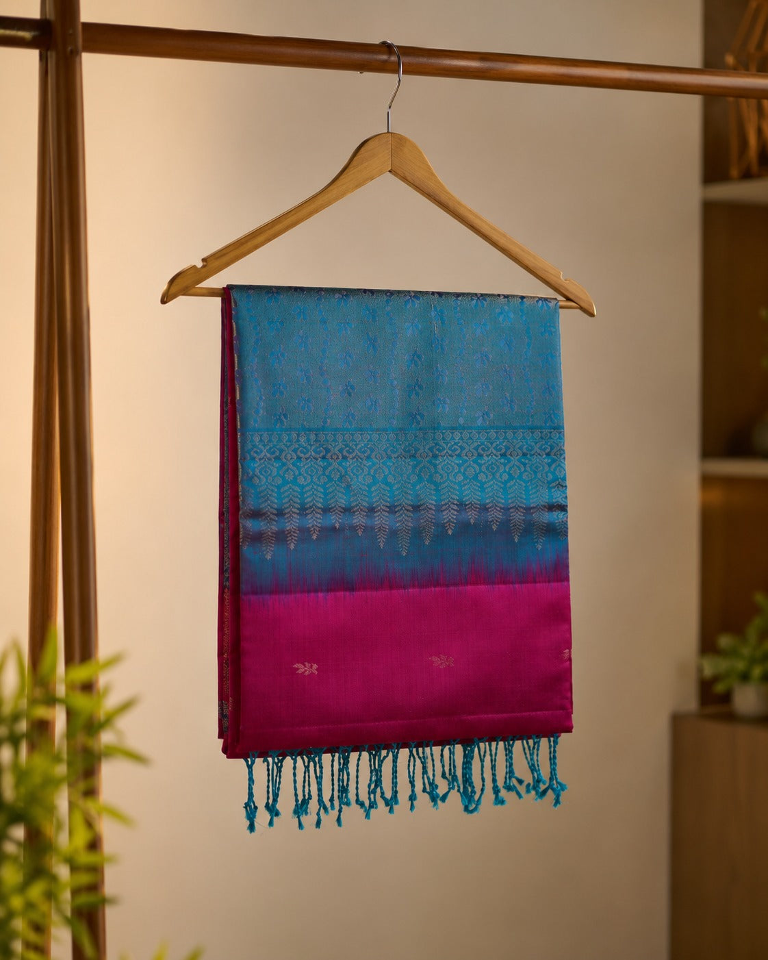 Neelatarang - A vivid play of pink and peacock teal.