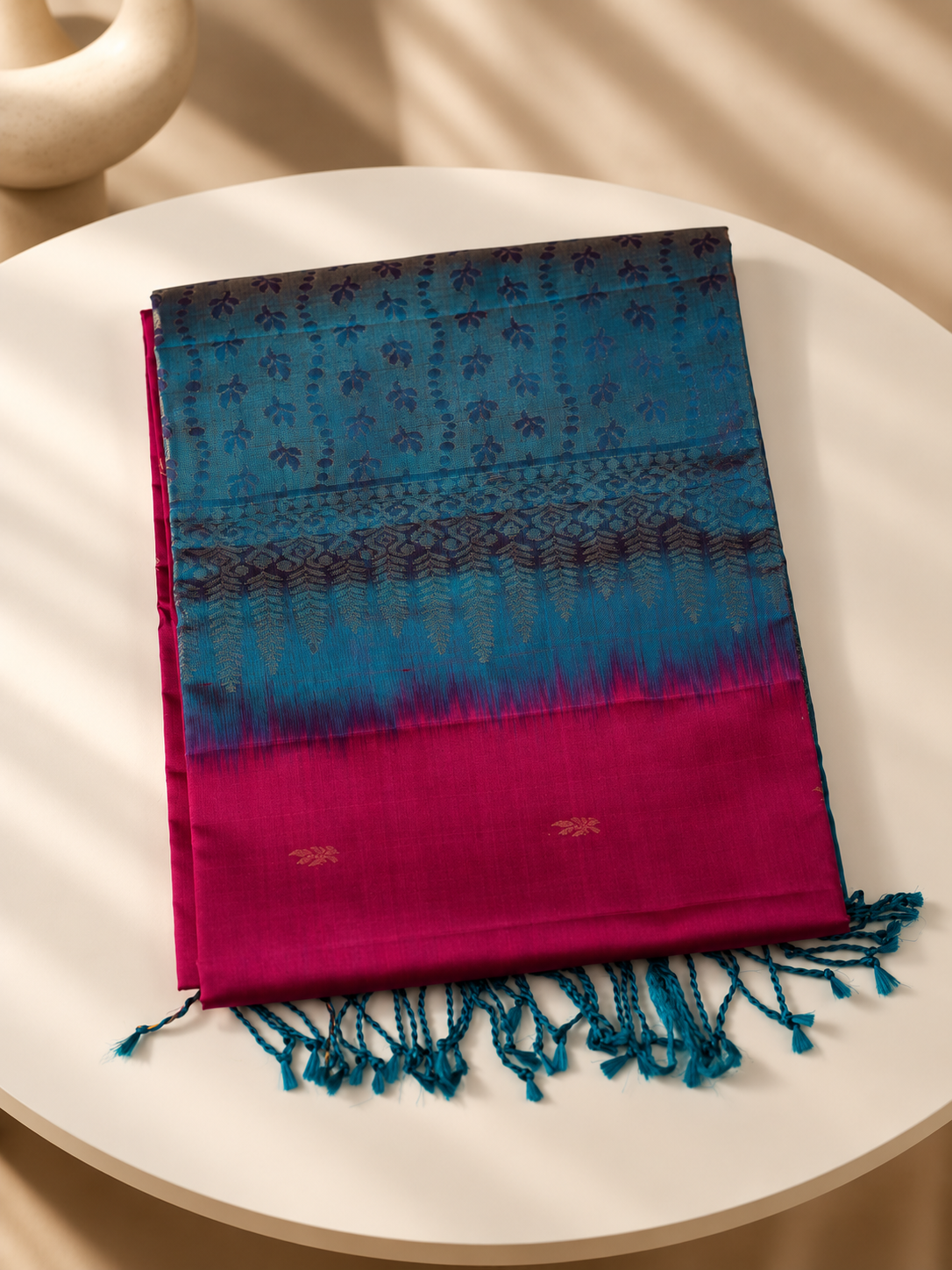 Neelatarang - A vivid play of pink and peacock teal.