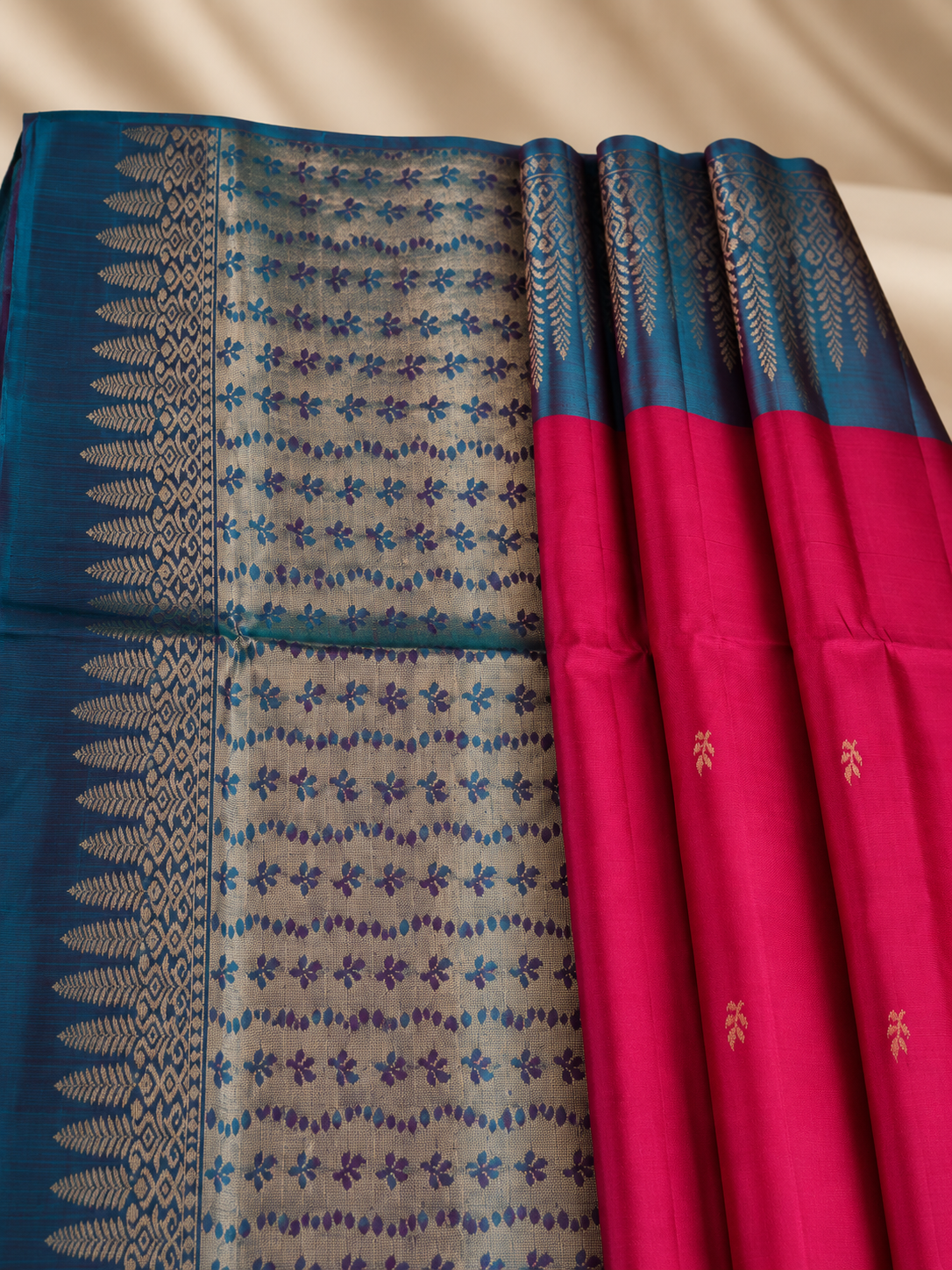 Neelatarang - A vivid play of pink and peacock teal.