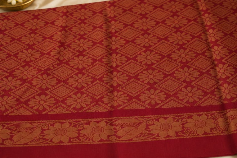 Sindoor Pushpa - A timeless bloom in sindoor & gold.